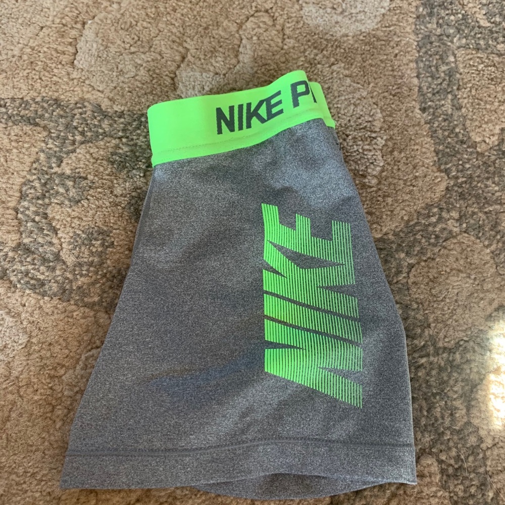 GRAY AND GREEN NIKE PROS